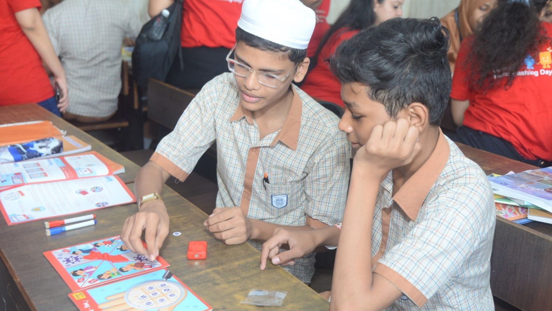 School children playing games by Lifebuoy and Imagimake that inculcate the healthy habit of handwashing with soap.