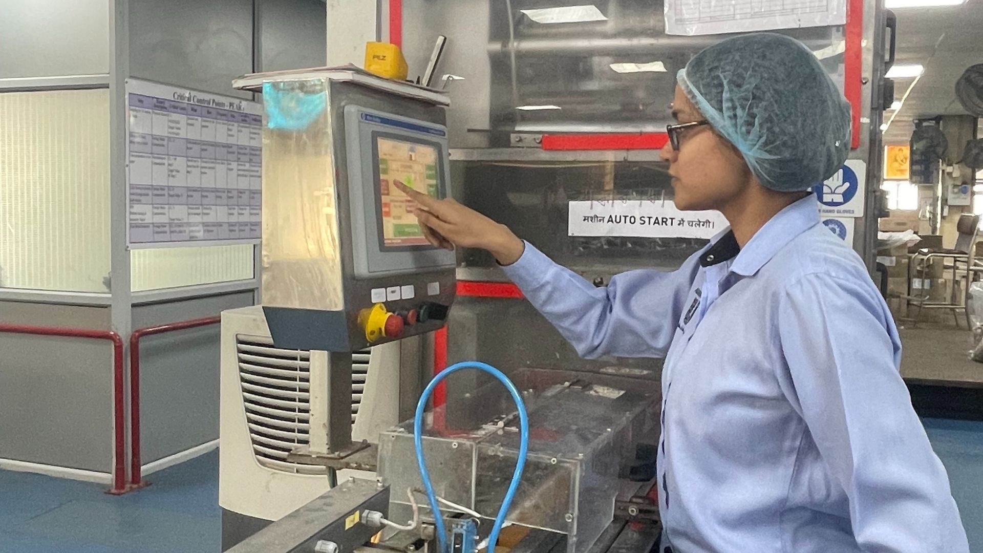 A lady  employee at HUL's factory.