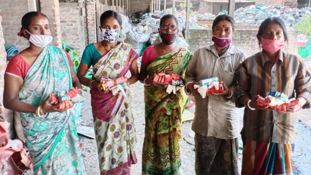 Image of sanitation workers with Lifebuoy soaps donated as part of COVID relief work