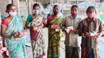 Image of sanitation workers with Lifebuoy soaps donated as part of COVID relief work