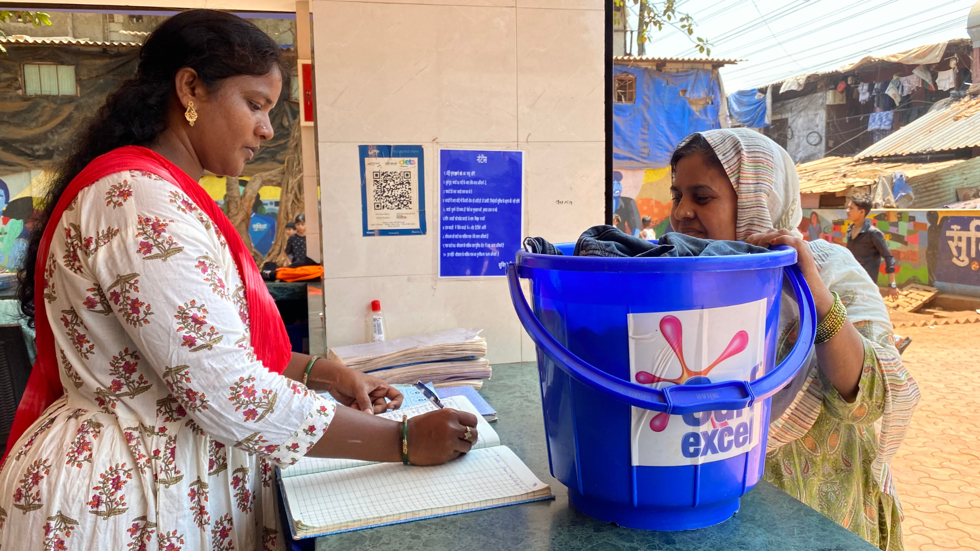 A lady worker at HUL Suvidha centre in the laundromat section