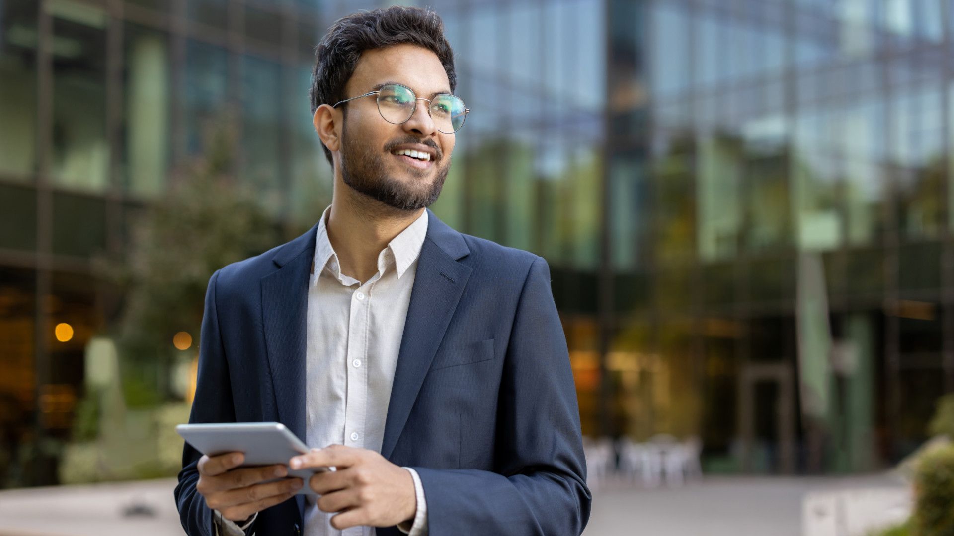 A business man holding a pad