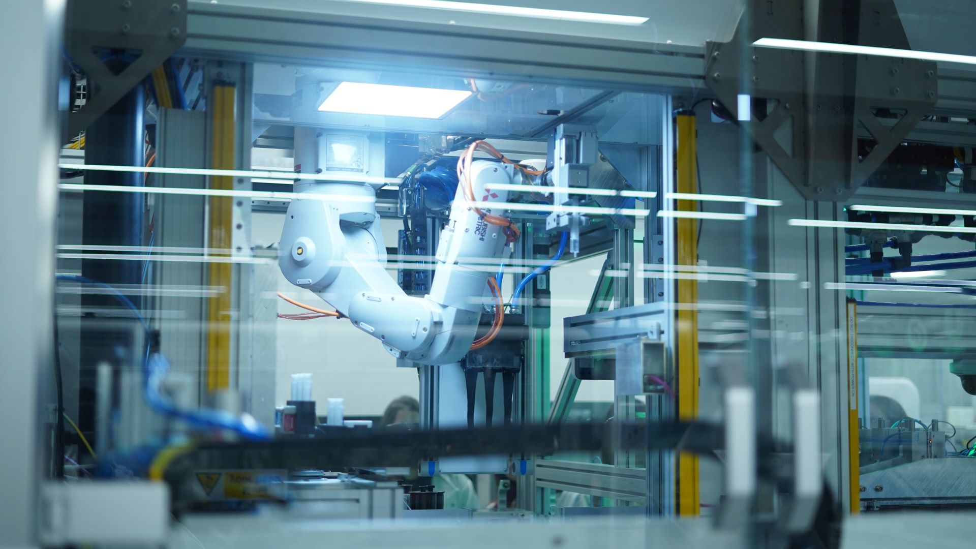 A robot at the Materials Innovation Factory washing hair.