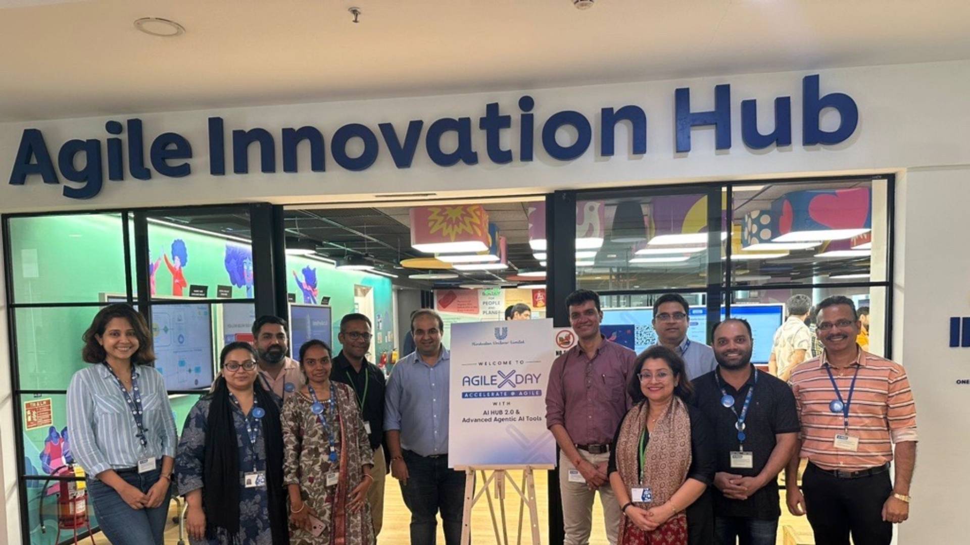 Group photo at Agile Innovation Hub entrance.