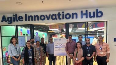 Group photo at Agile Innovation Hub entrance.
