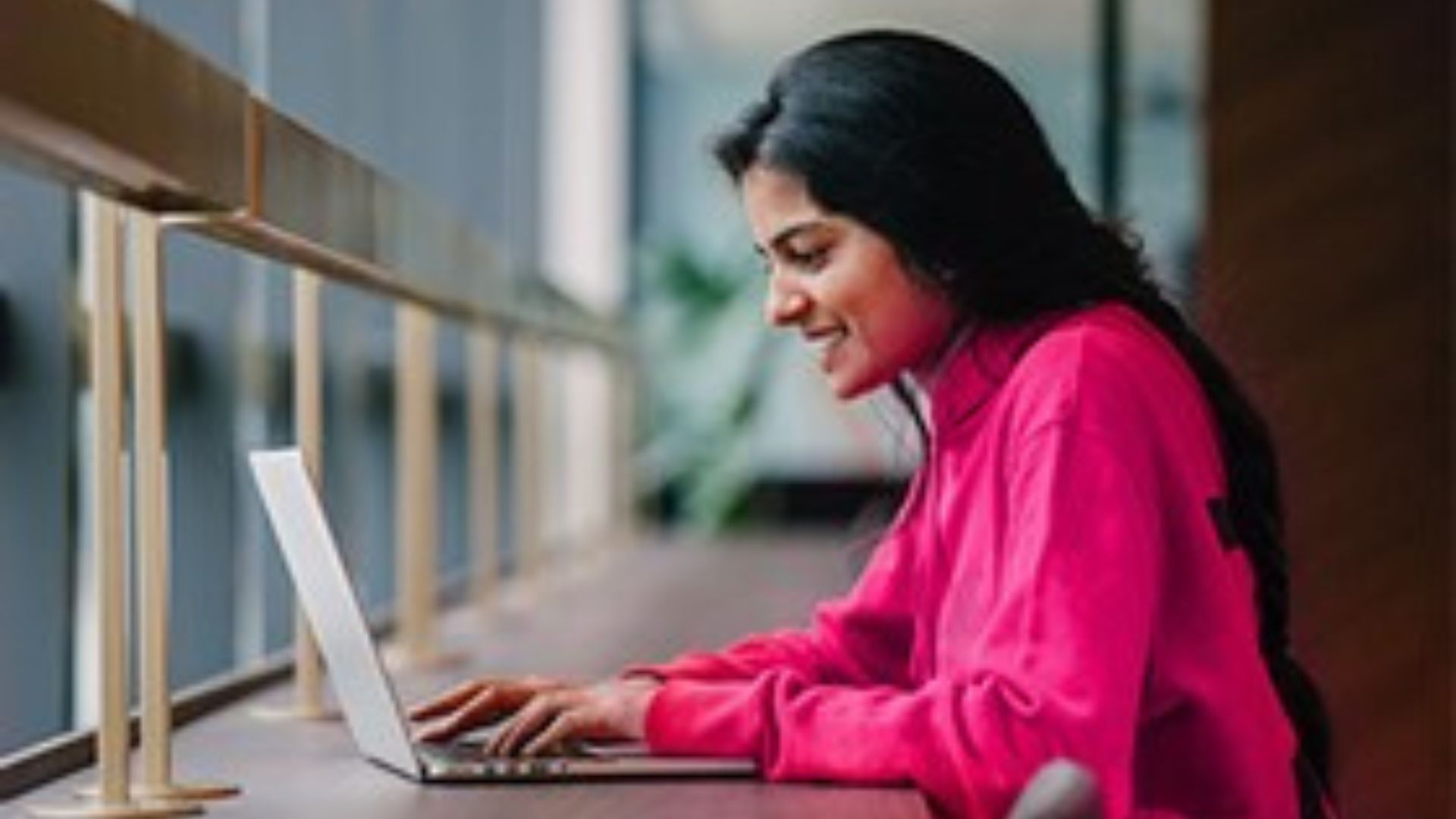 A woman working at her computer