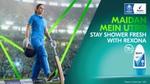 Cricketer in blue uniform with Rexona ad.