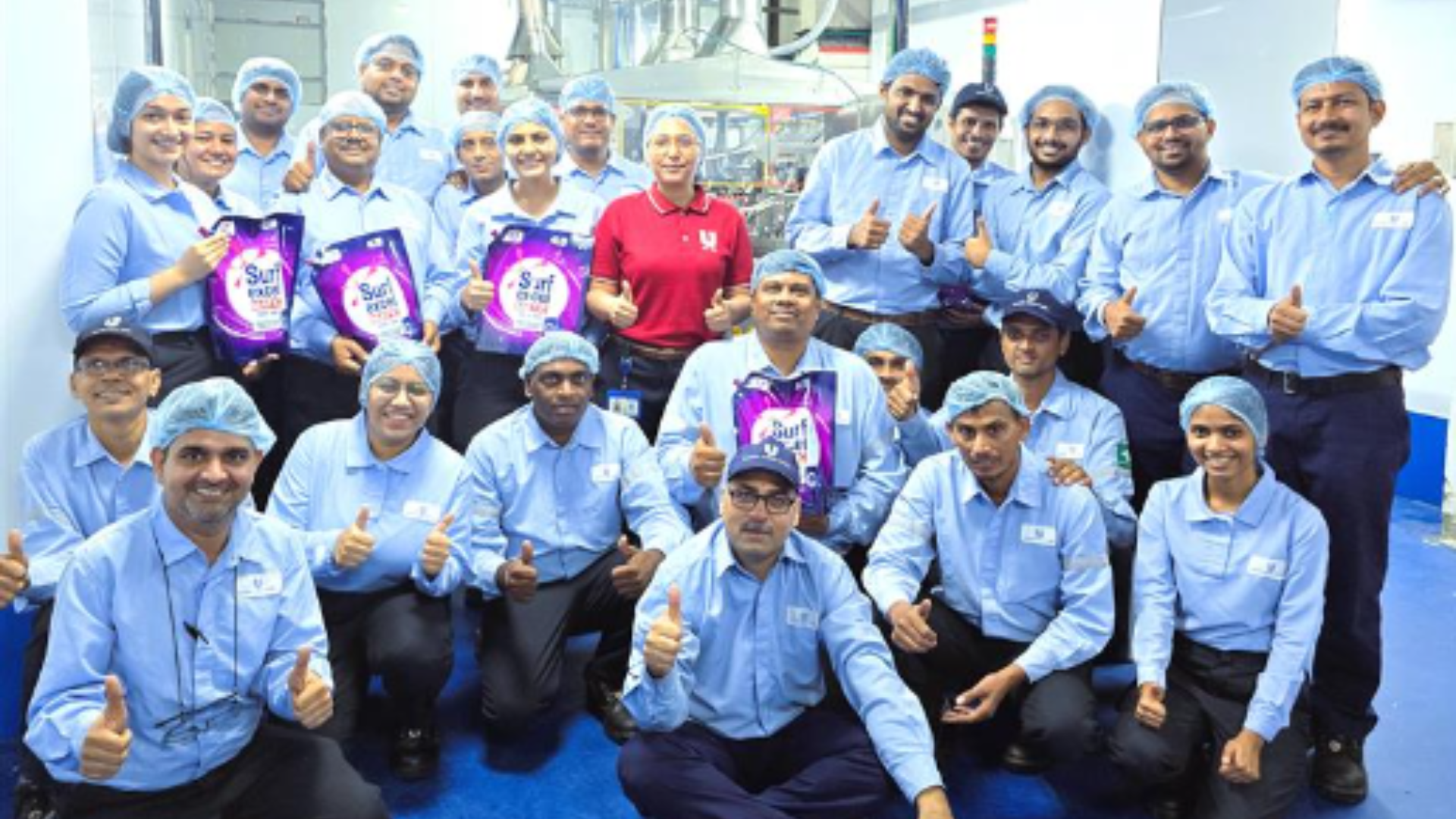 Factory workers together with Sharmishtha Biswas