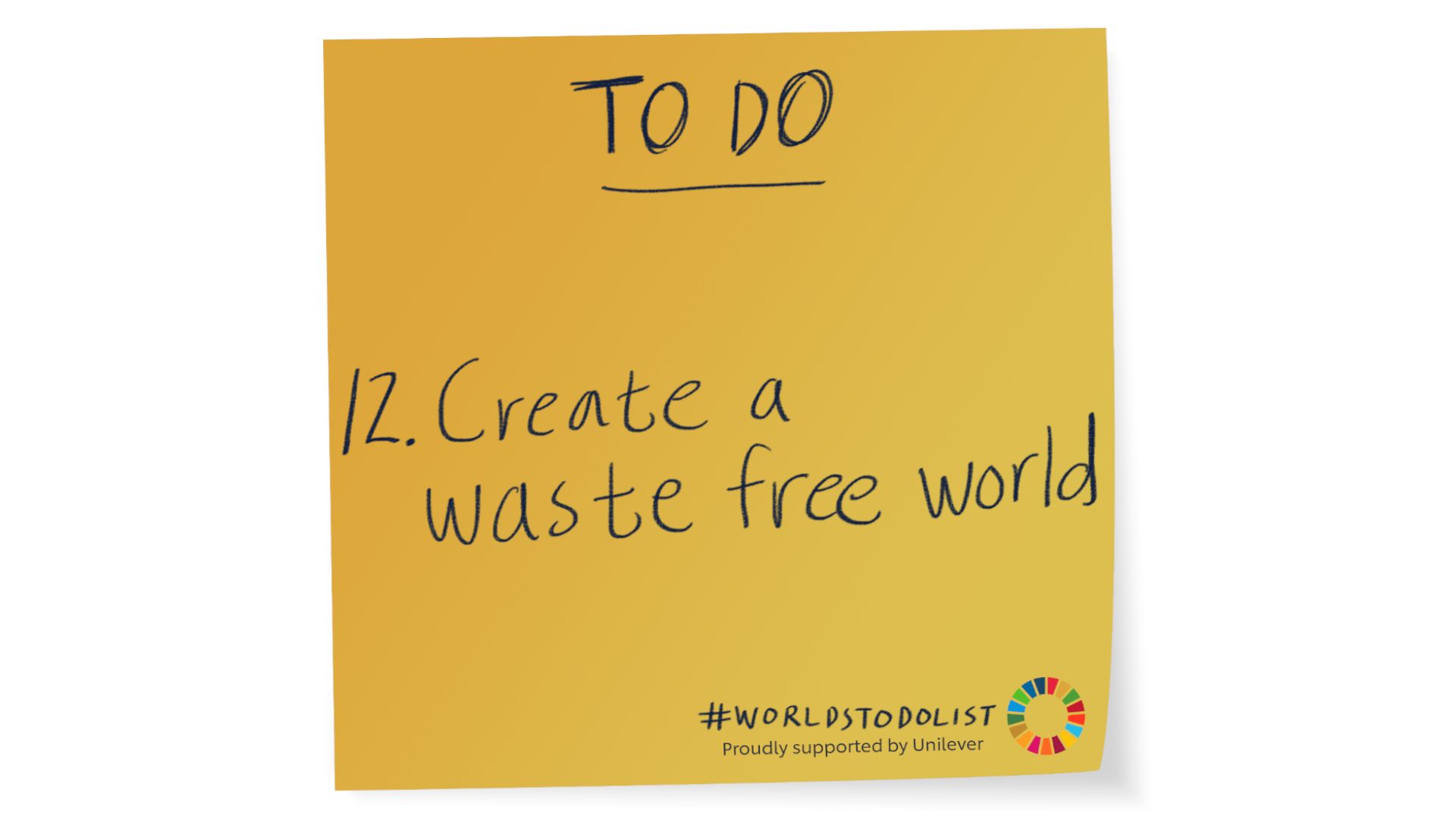 Mustard coloured sticky note with Create a waste free world written on it