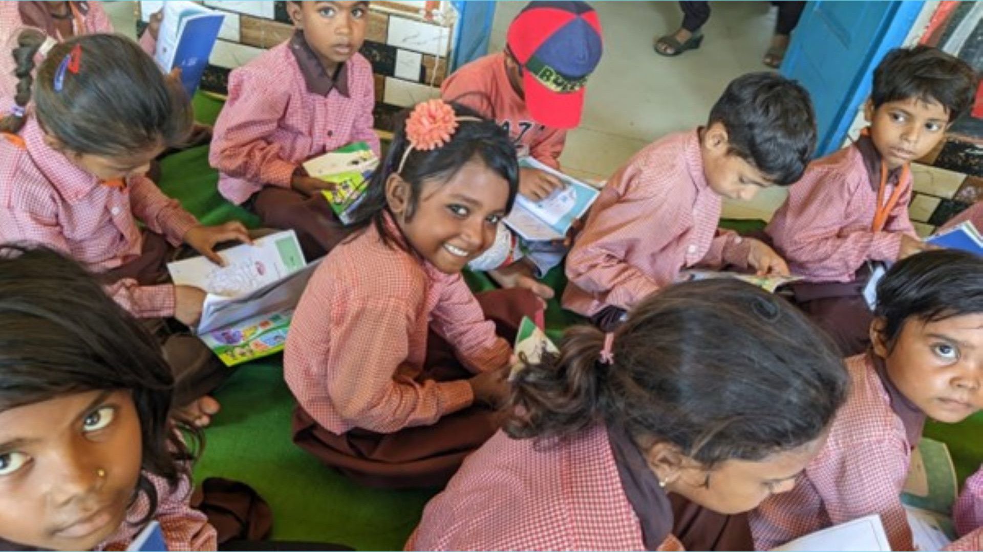 A class of students reading the Swasthya curriculum developed by HUL.
