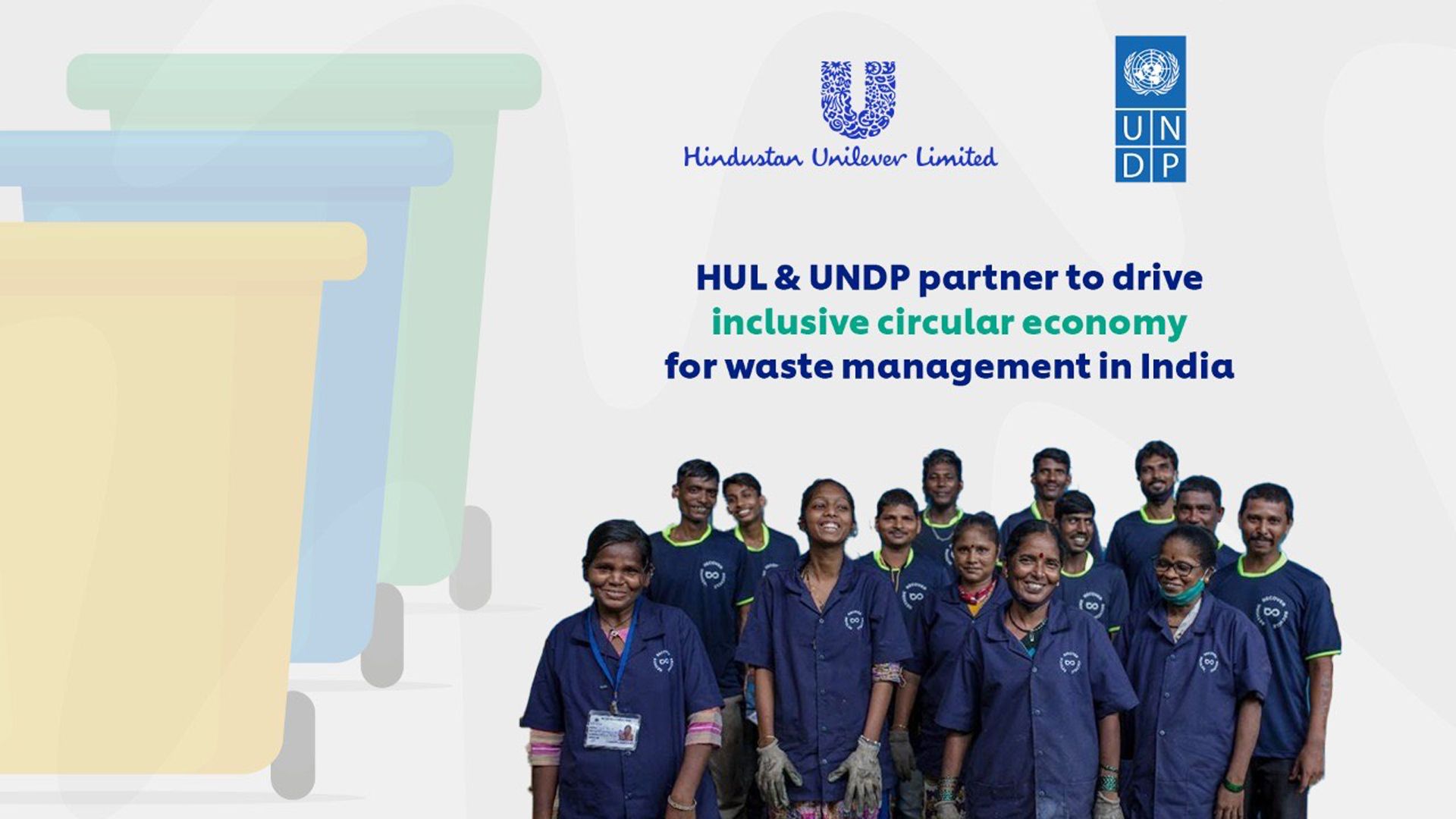 An image of a group of waste workers from India wearing a blue uniform
