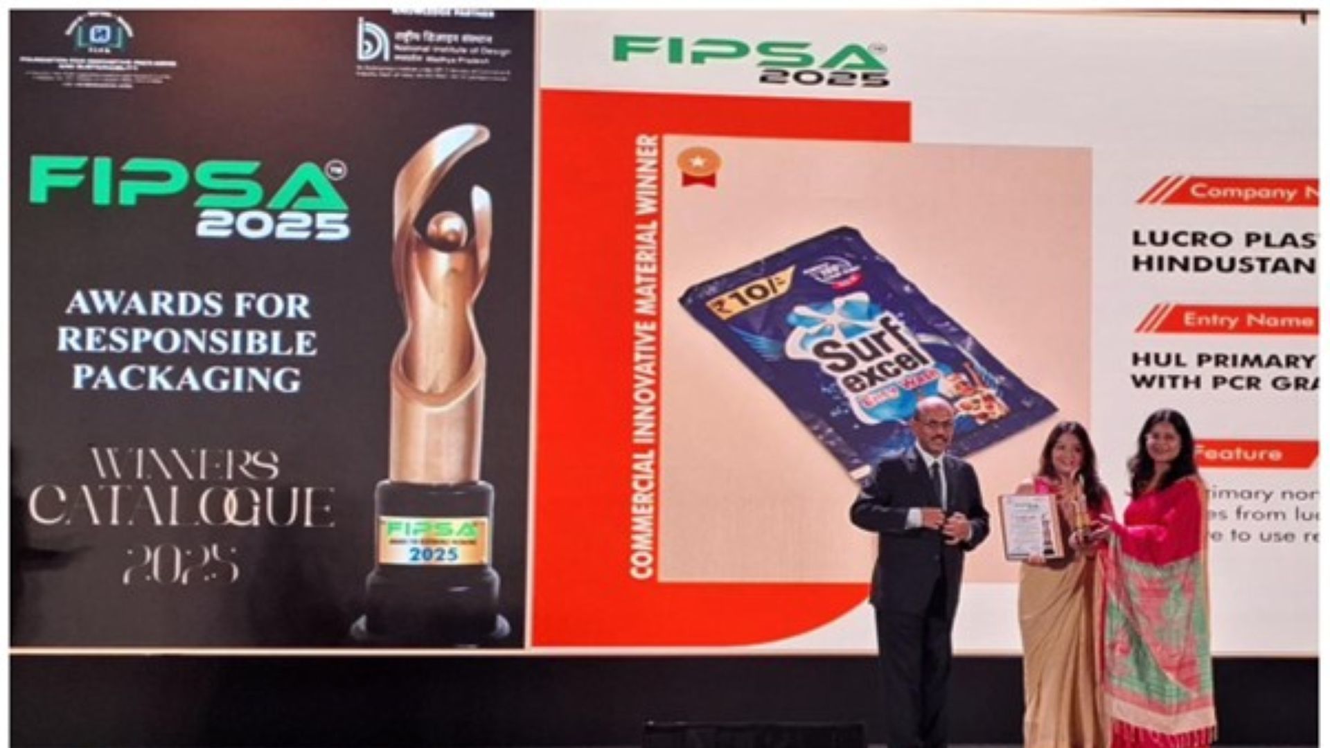 Three people with the FIPSA award.