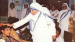 A picture of Mother Teresa blessing a young boy at Ashadaan, Byculla.