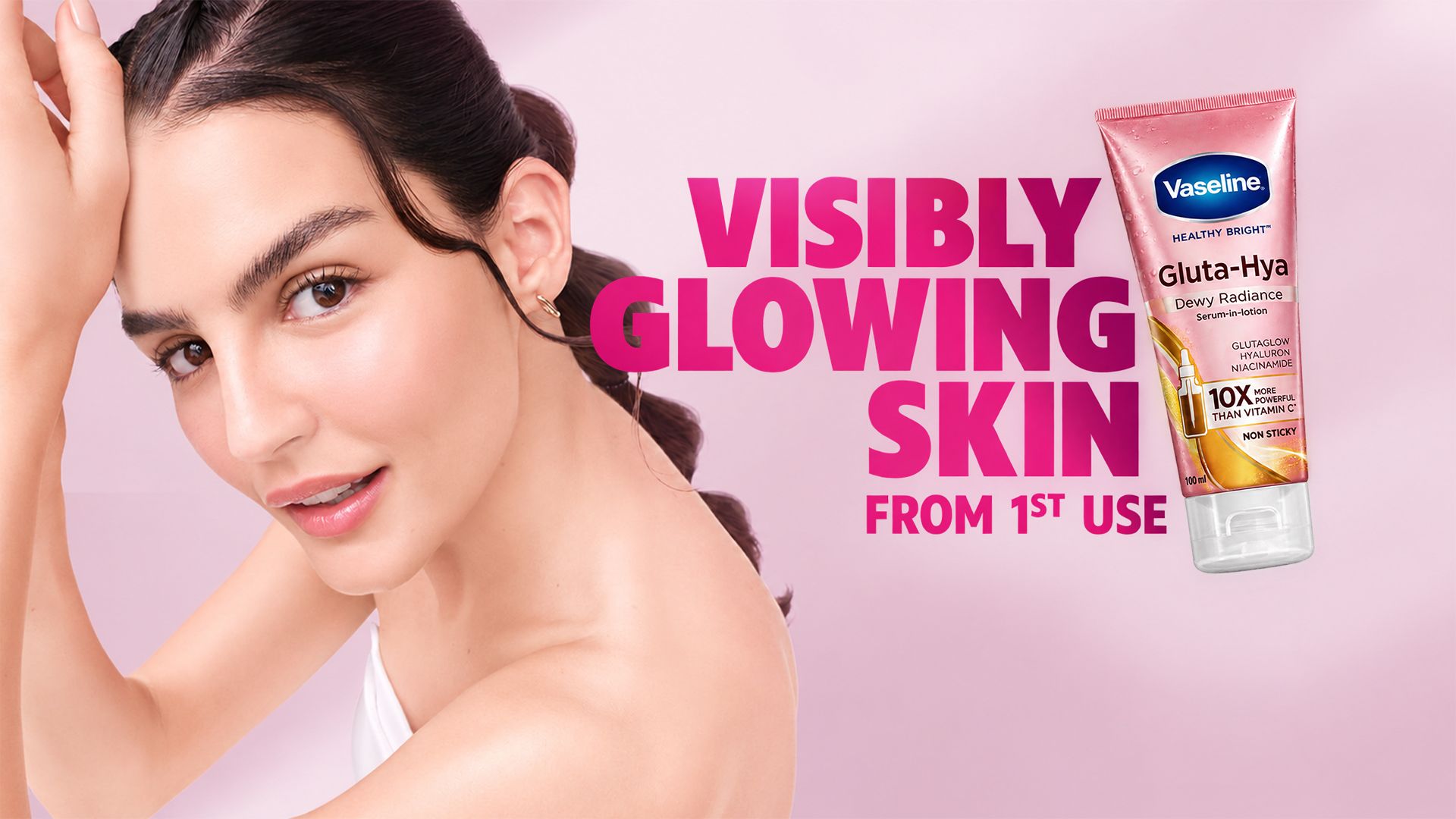 Woman beside Vaseline Gluta-Hya Dewy Radiance lotion with text promising visibly glowing skin from first use.