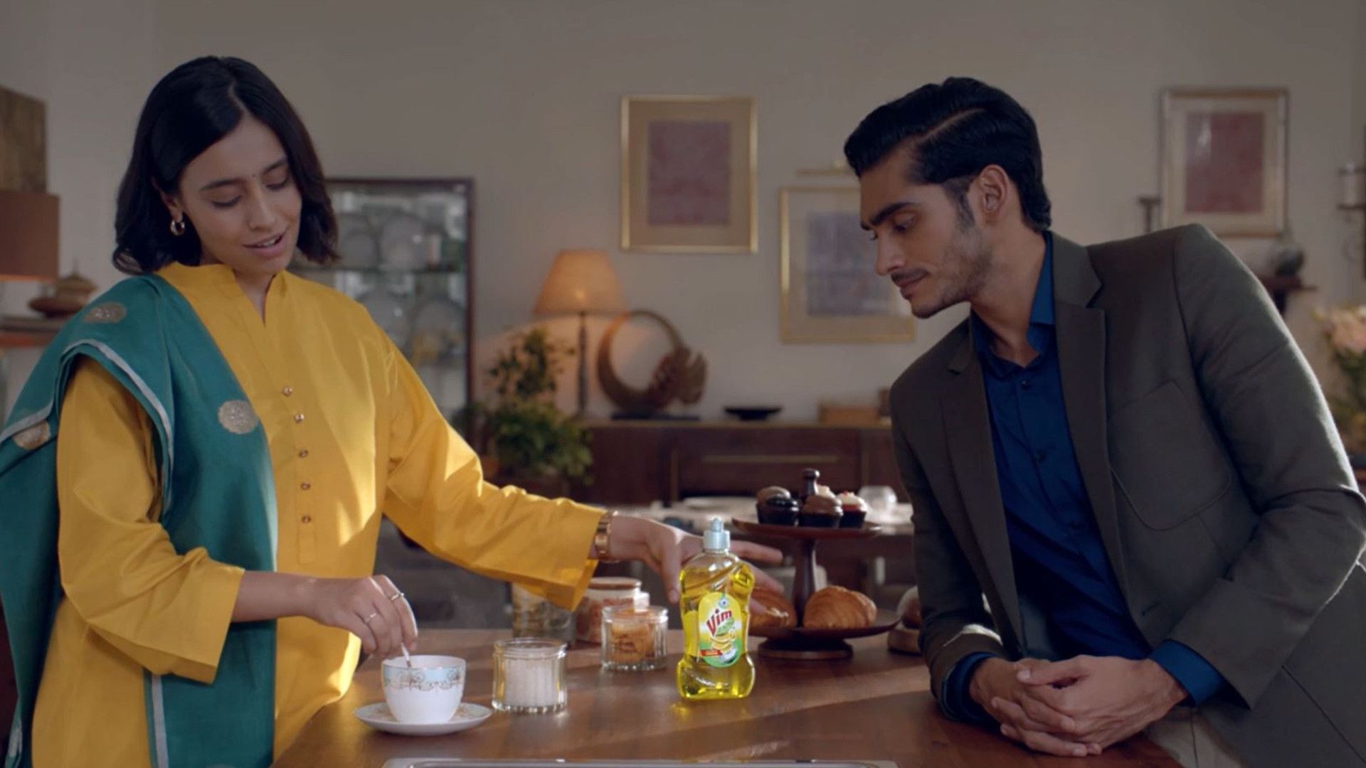 Image of young couple at a kitchen counter