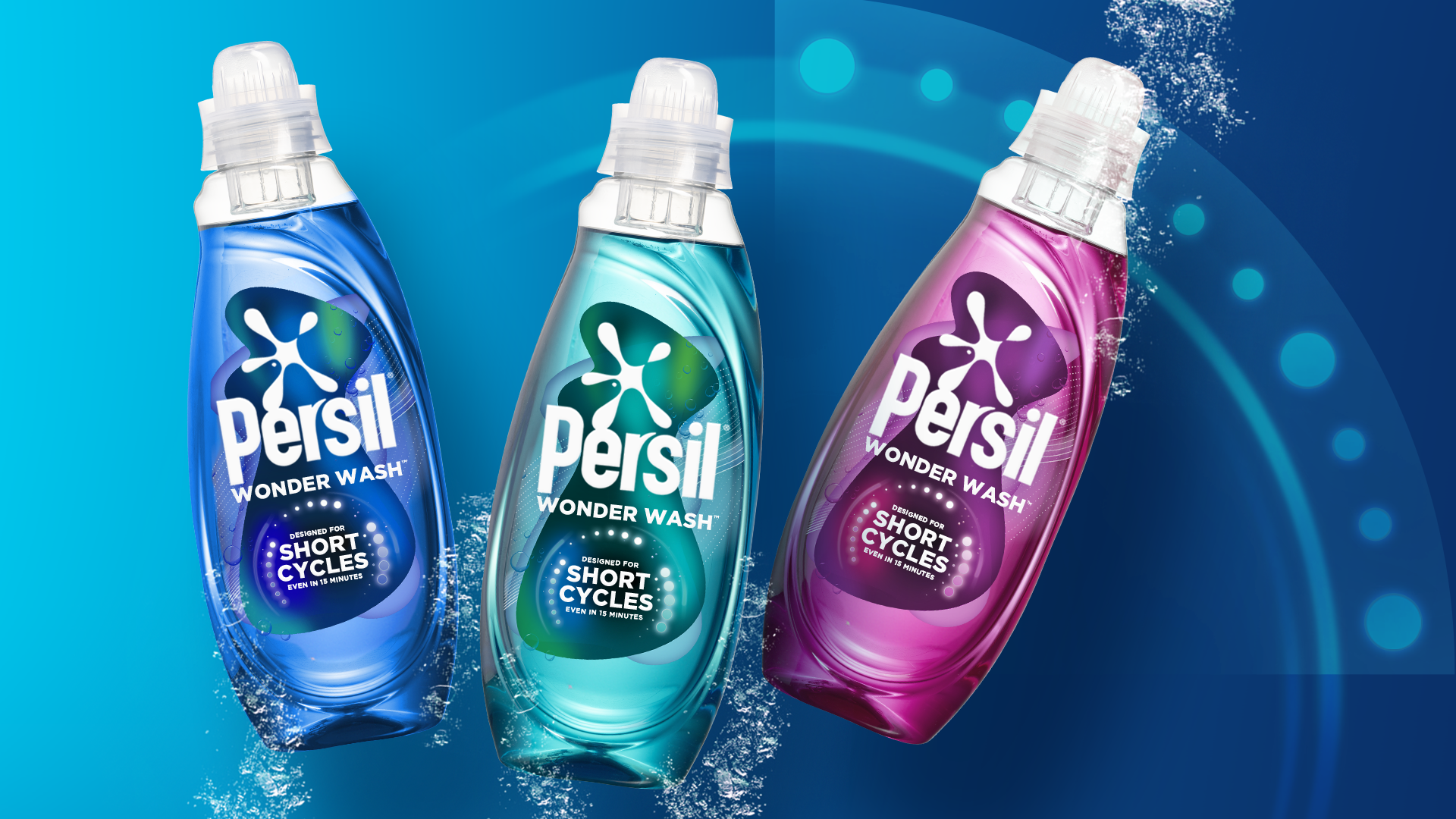 A blue, turquoise and pink bottle of Persil Wonder Wash on a teal backdrop.