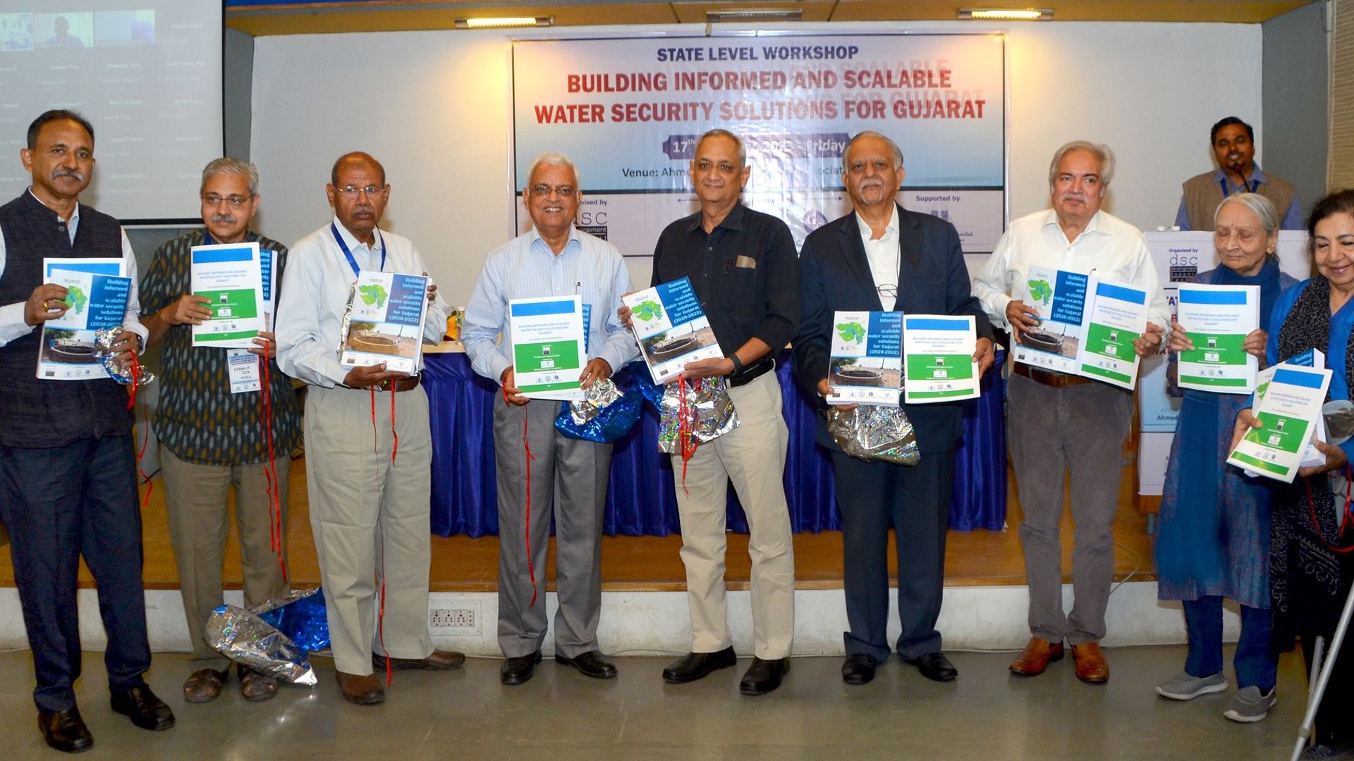 A group photo taken at an event to launch a water study done for Gujarat