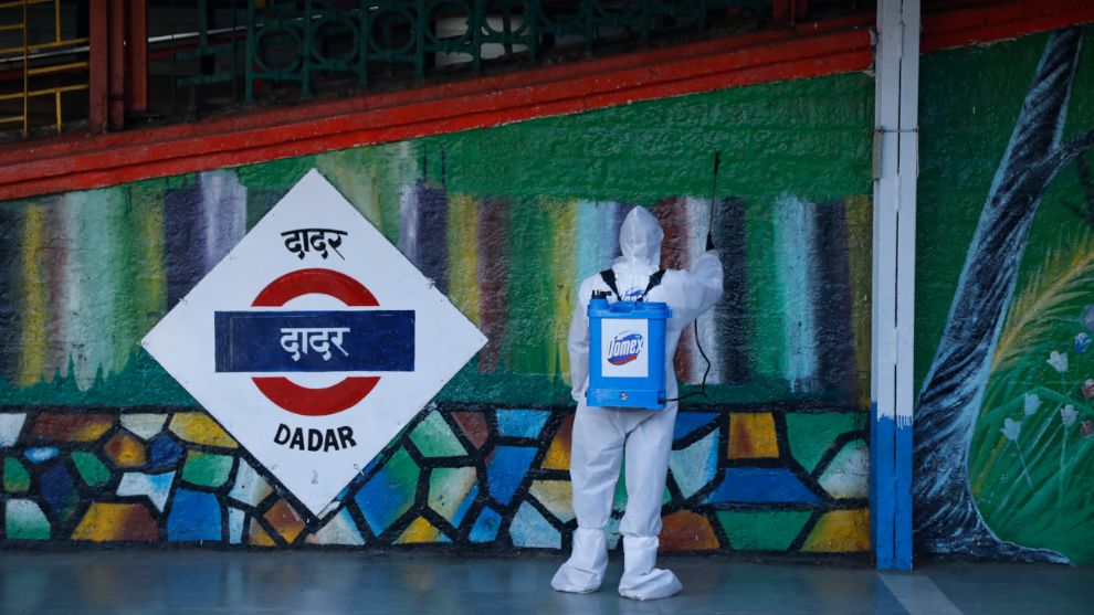 Domex safeguard cleaning a wall