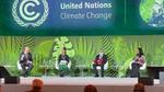 Alan Jope sits far left on stage at the World Leaders Summit during COP26, the climate change summit in Glasgow