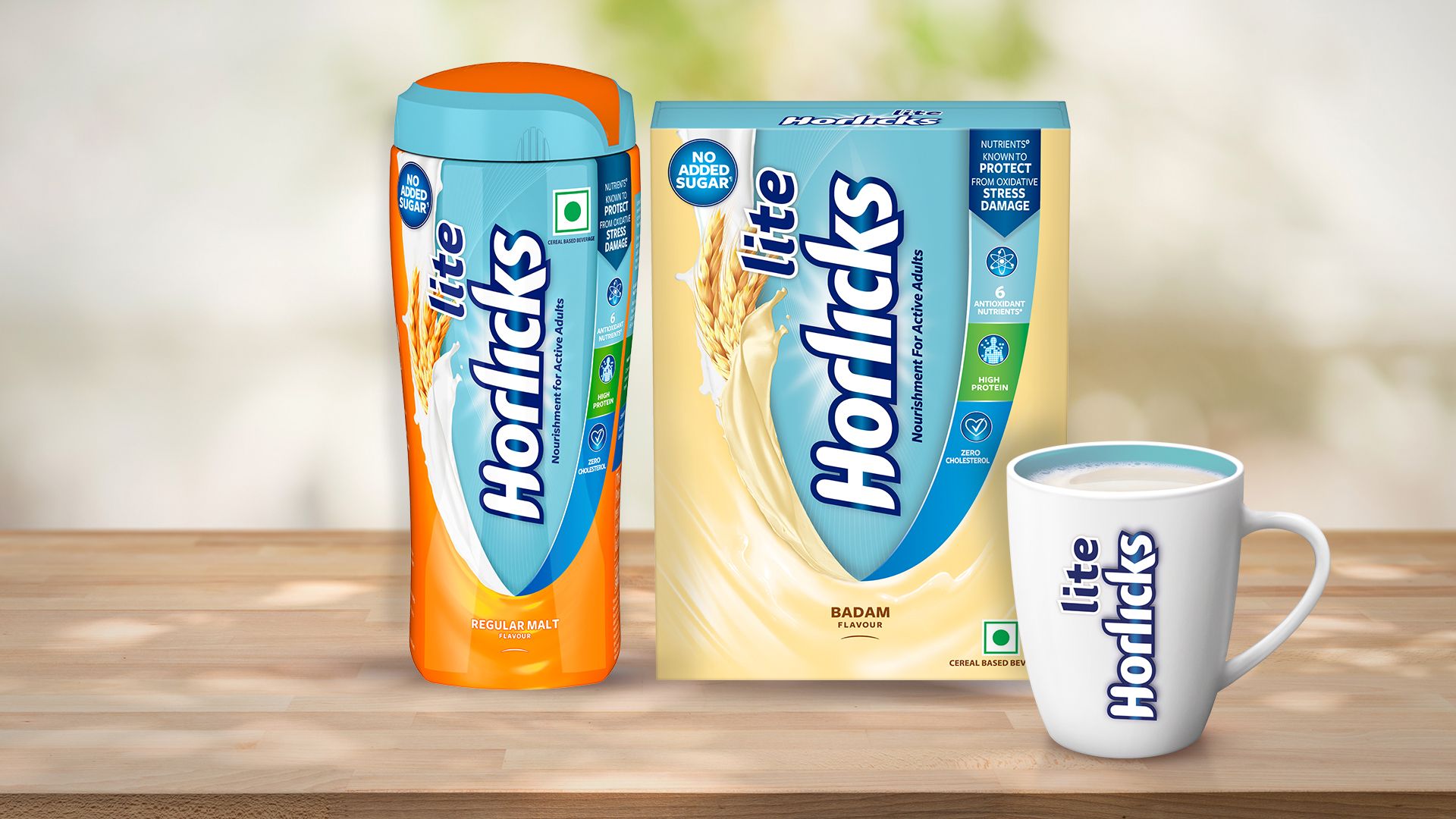 Horlicks Lite nutrition drink in regular malt and badam flavours, along with a branded white mug with Horlicks Lite is shown filled with the drink.