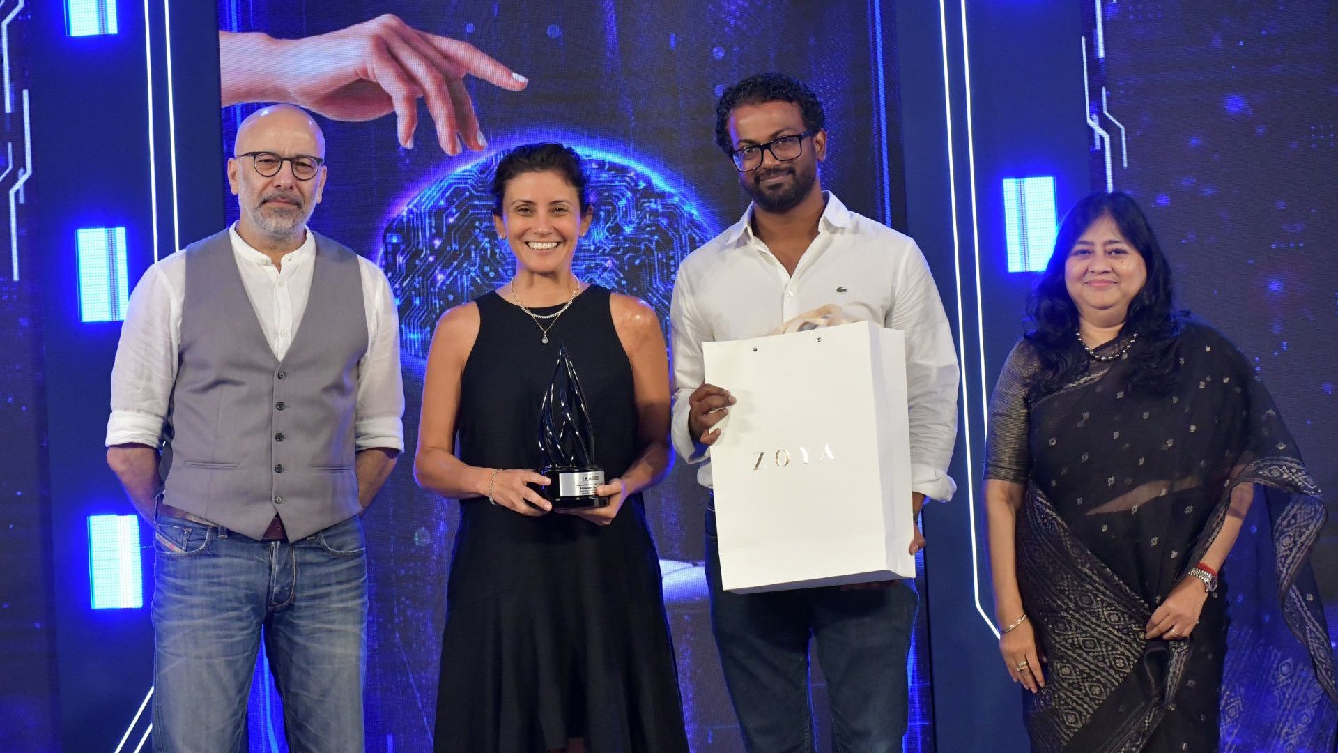 Four people with the IAA Leadership award.