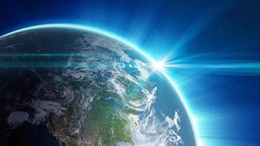 Image of a globe with a ray of light